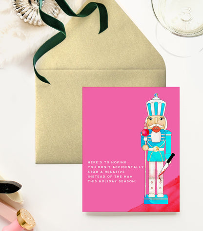 Stabbing Holiday Nutcracker Funny Christmas Greeting Card